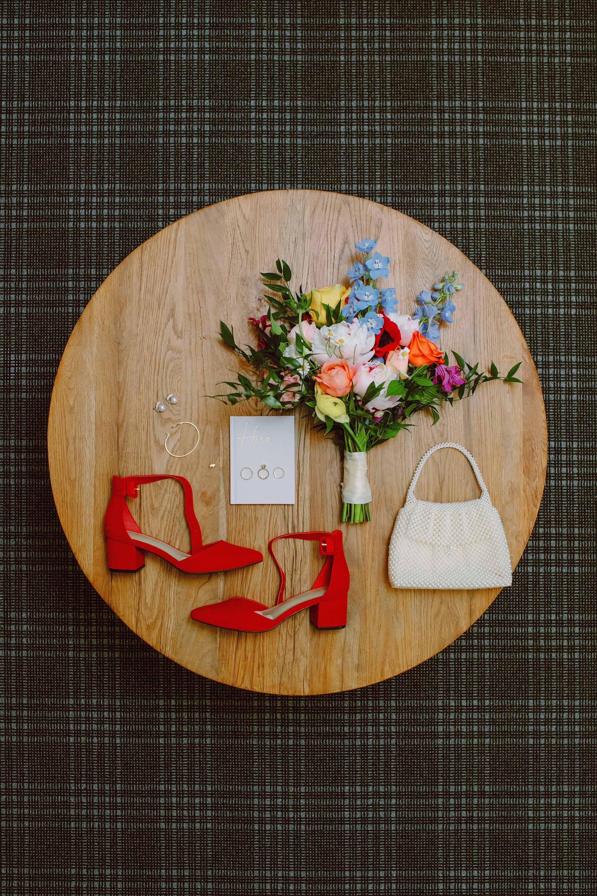 wedding photographs by Love Knot Photography, bridal details including the gorgeous and colorful bridal bouquet, shoes, vow book, wedding rings, engagement ring, jewelry and clutch