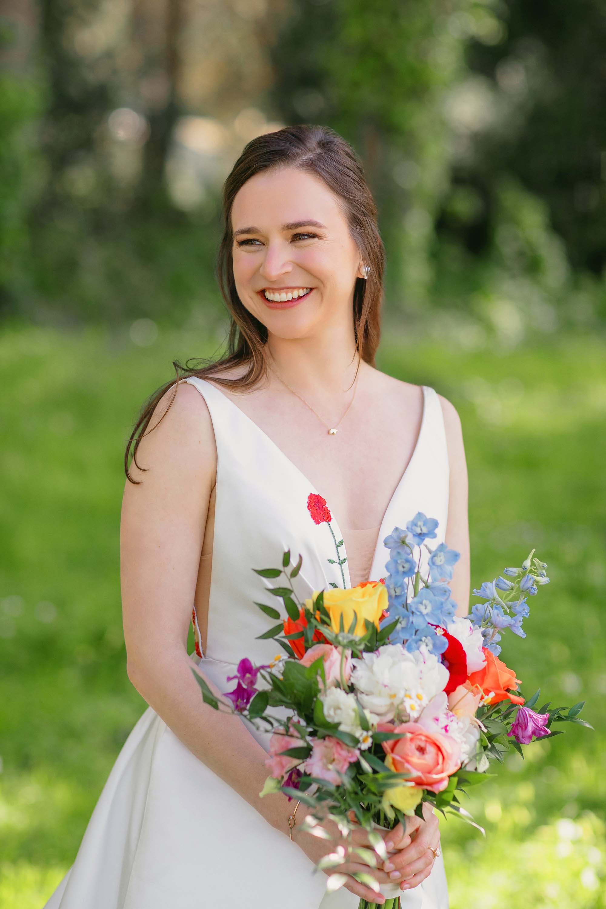 wedding photographer captures gorgeous bride in outdoor setting with natural light, moments before her first look with groom on wedding day. Credit: Love Knot Photography by Isaac Klotz