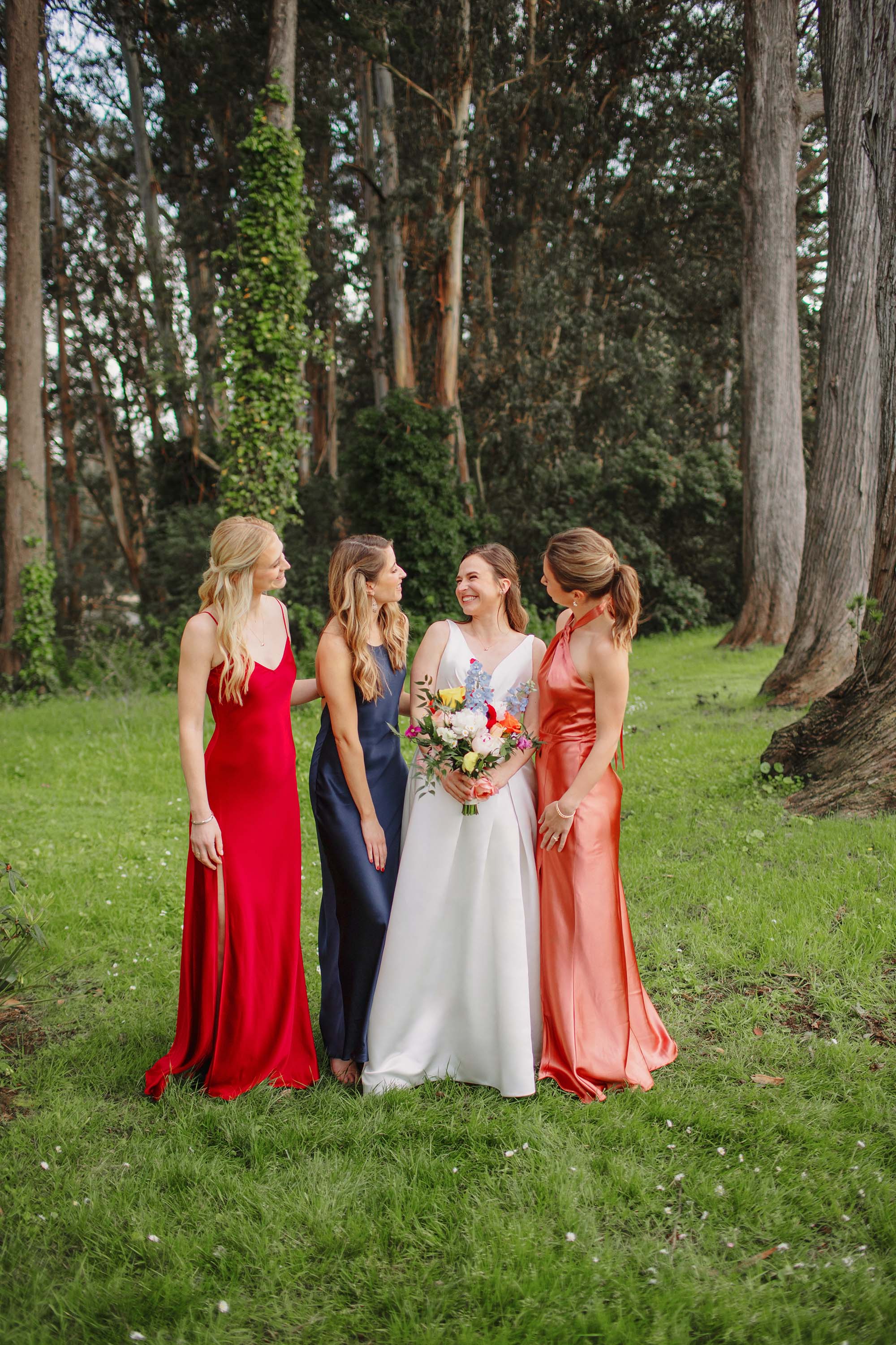 Wedding portrait of bride and her bridesmaids in San Francisco Presidio. Credit: Love Knot Photography by Isaac Klotz