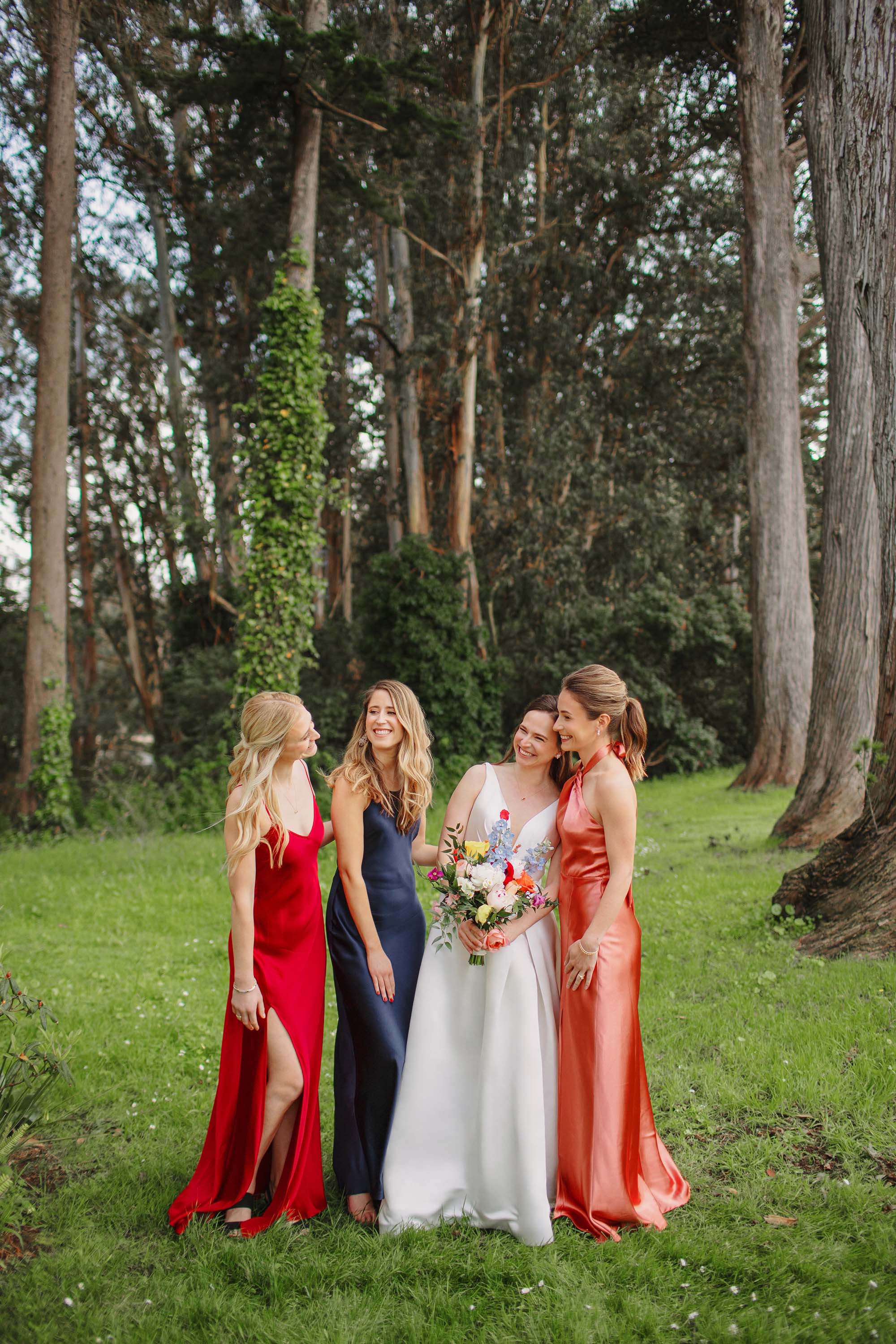Wedding portrait of bride and her bridesmaids in San Francisco Presidio. Credit: Love Knot Photography by Isaac Klotz
