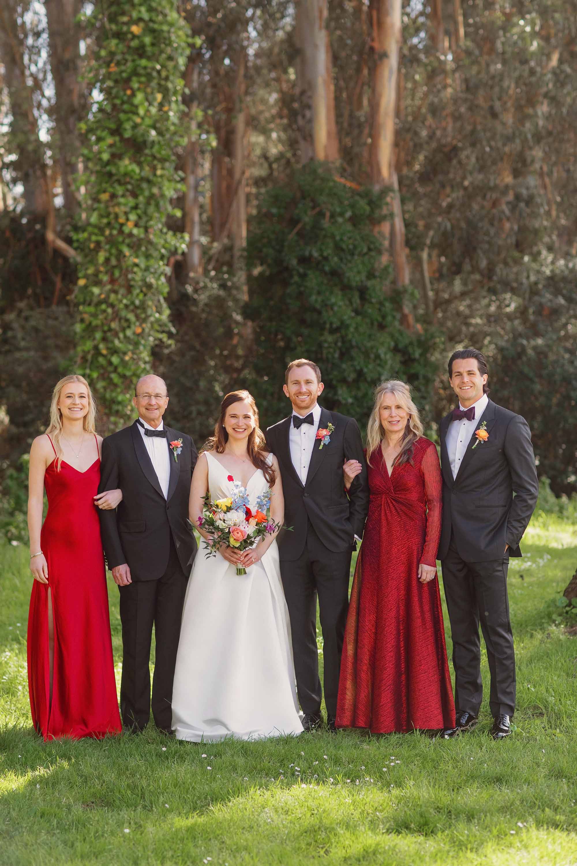 Wedding portrait of bride, groom and family. Credit: Love Knot Photography by Isaac Klotz