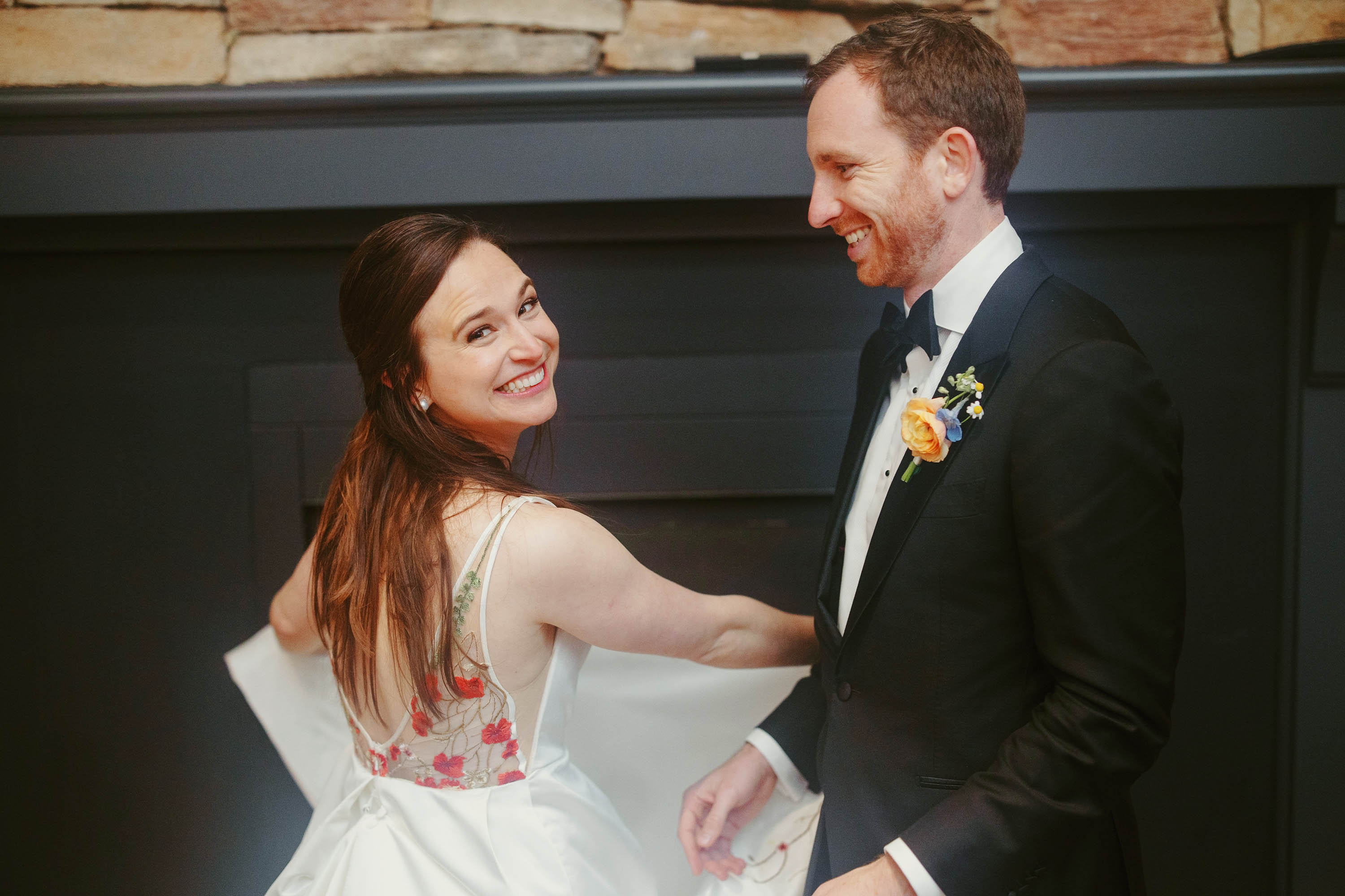 Bride and groom warm up fireside before their grand entrance into the reception. Credit: Love Knot Photography by Isaac Klotz