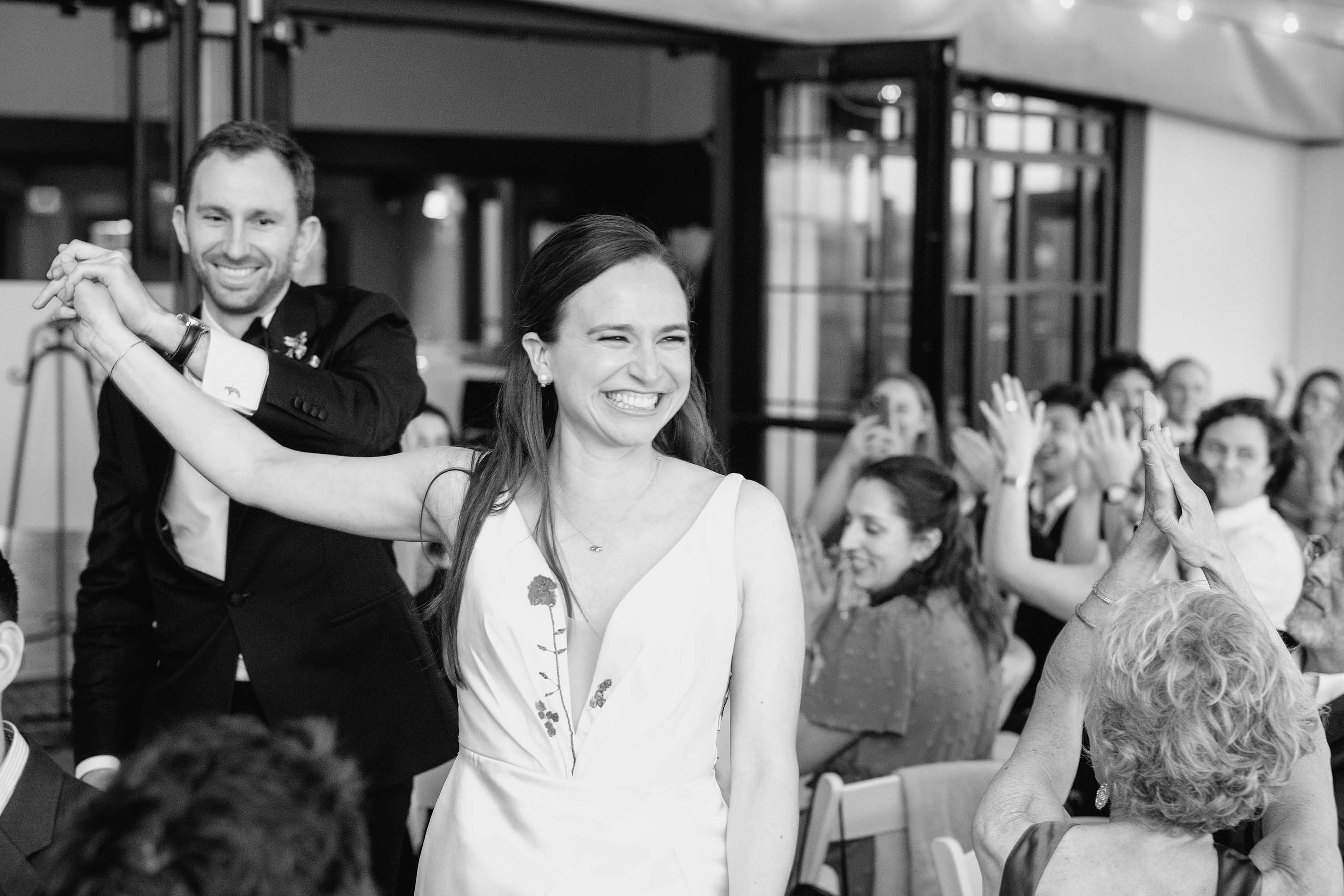 Bride and groom grand entrance into their reception. Credit: Love Knot Photography by Isaac Klotz