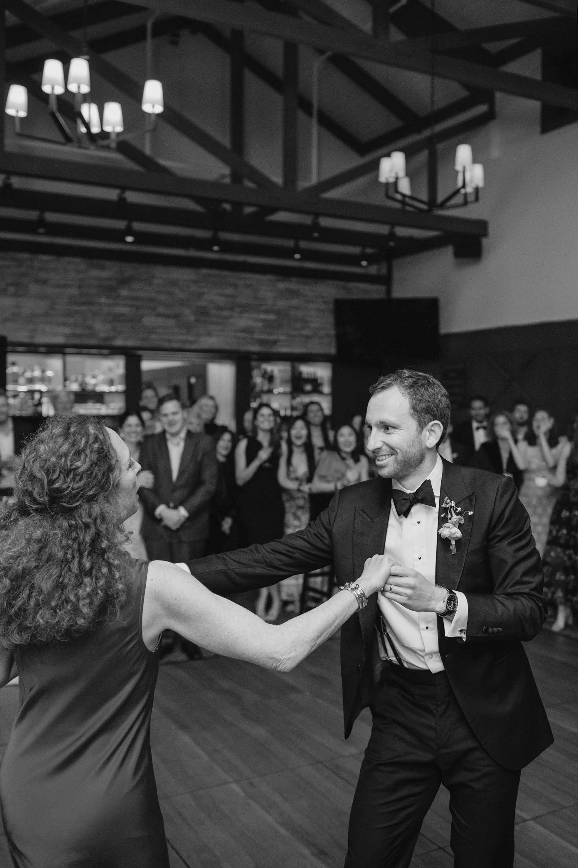 Groom with his mother, dancing during the wedding reception. Credit: Love Knot Photography by Isaac Klotz