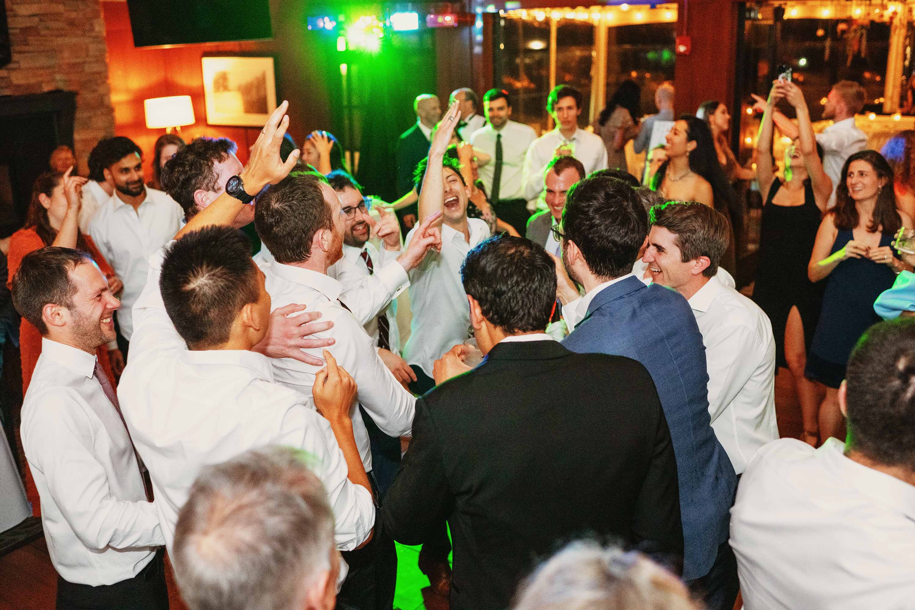 Great candid photo of dancing at the wedding reception. Credit: Love Knot Photography by Isaac Klotz