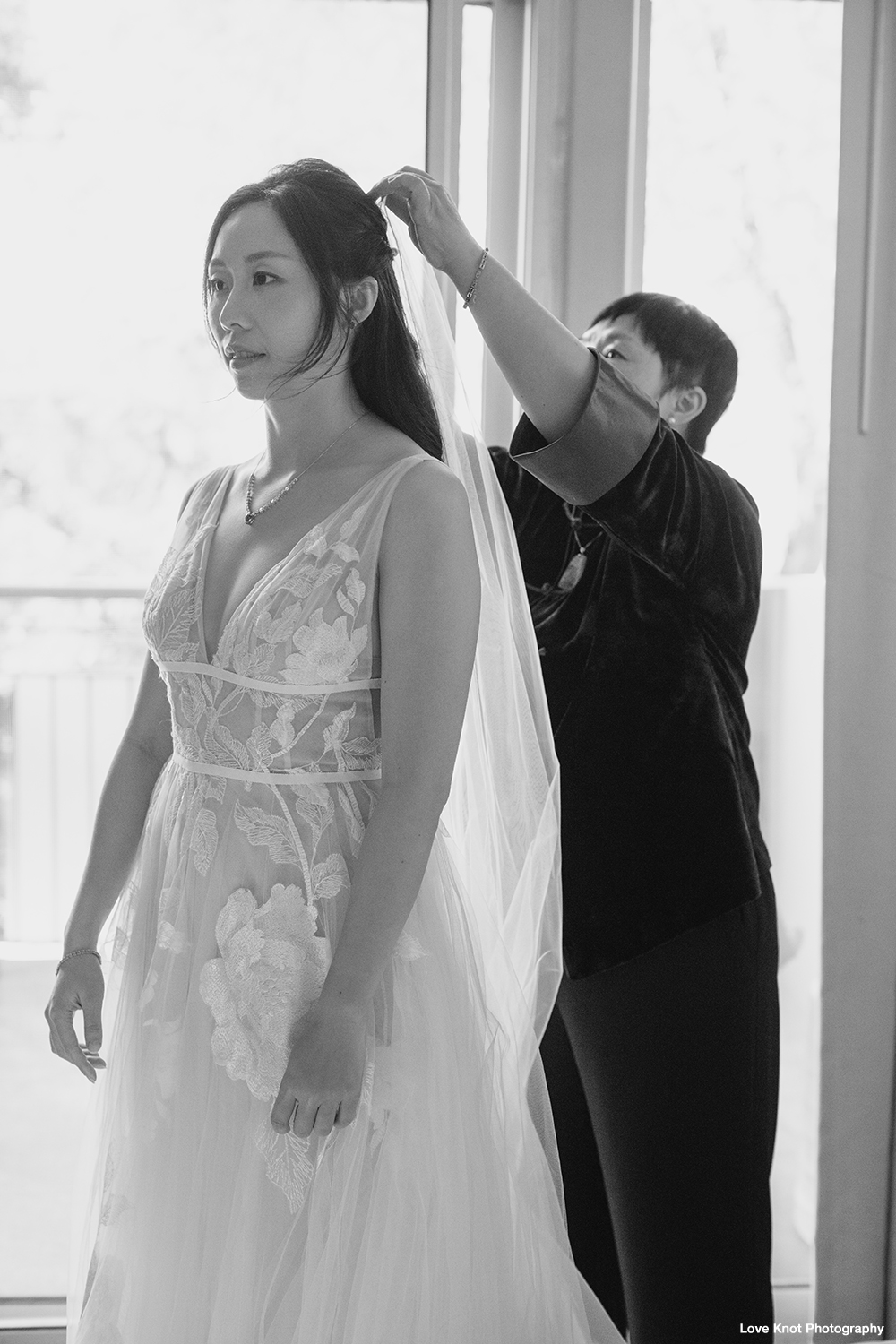 wedding photography of bride getting dressed