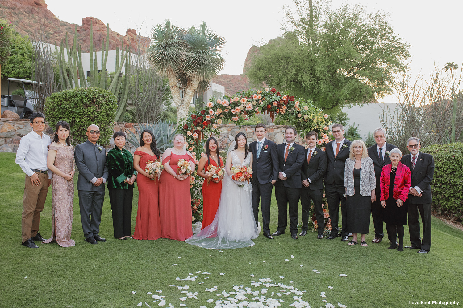 wedding photography portrait of bride and groom with family