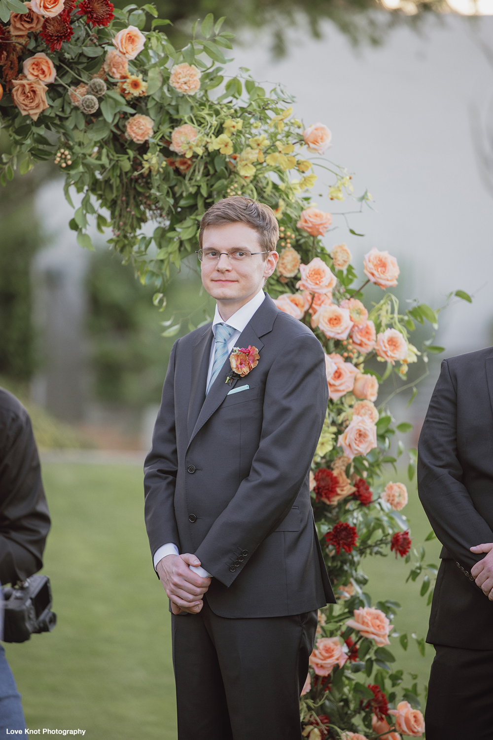 wedding photography of groom at ceremony by Love Knot Photography