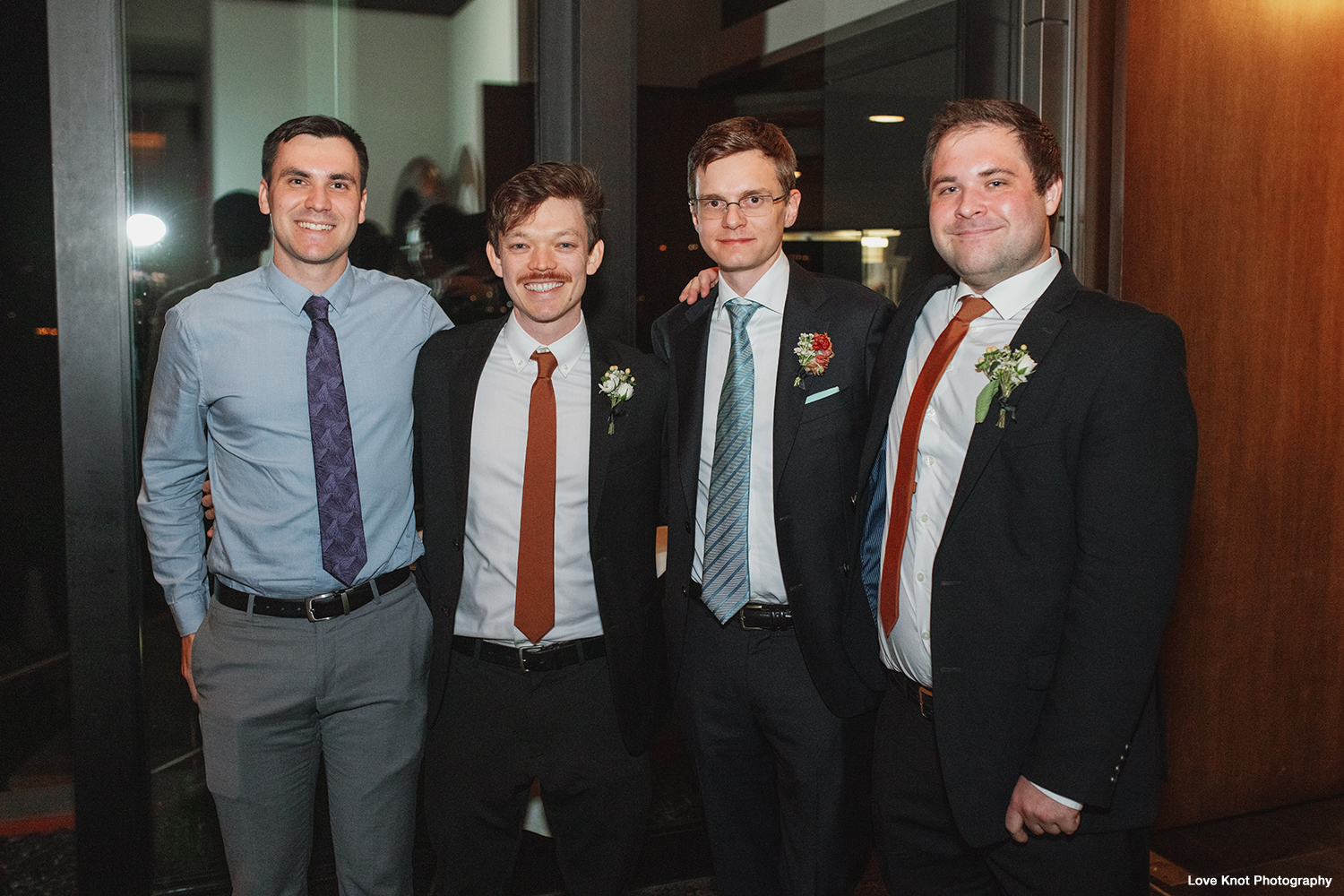 wedding photos of groom with his friends