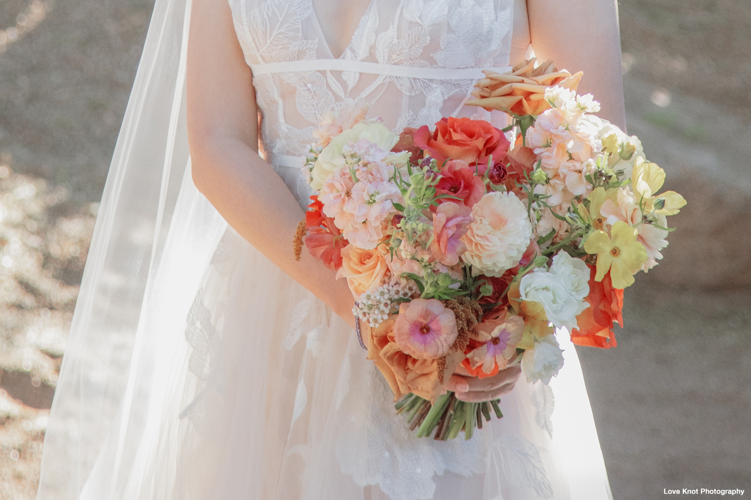 wedding portrait details of bride's bouquet