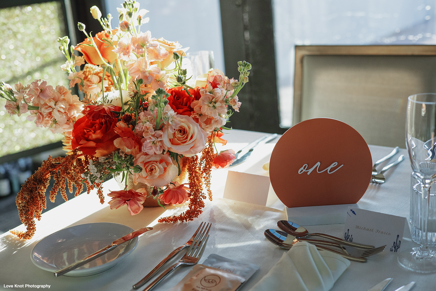 close up of table flowers on wedding day
