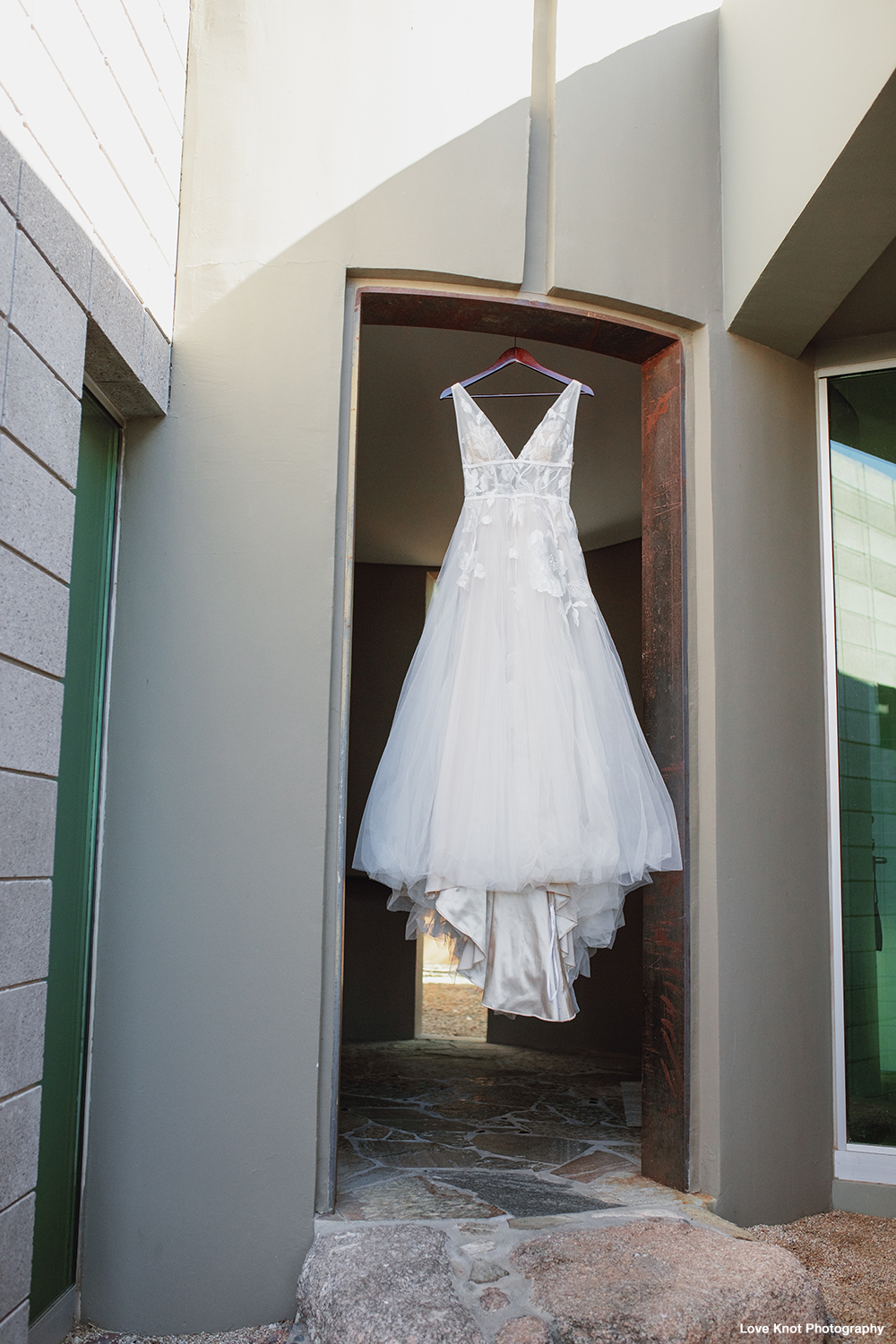 wedding day detail photo of white wedding dress is absolutely gorgeous