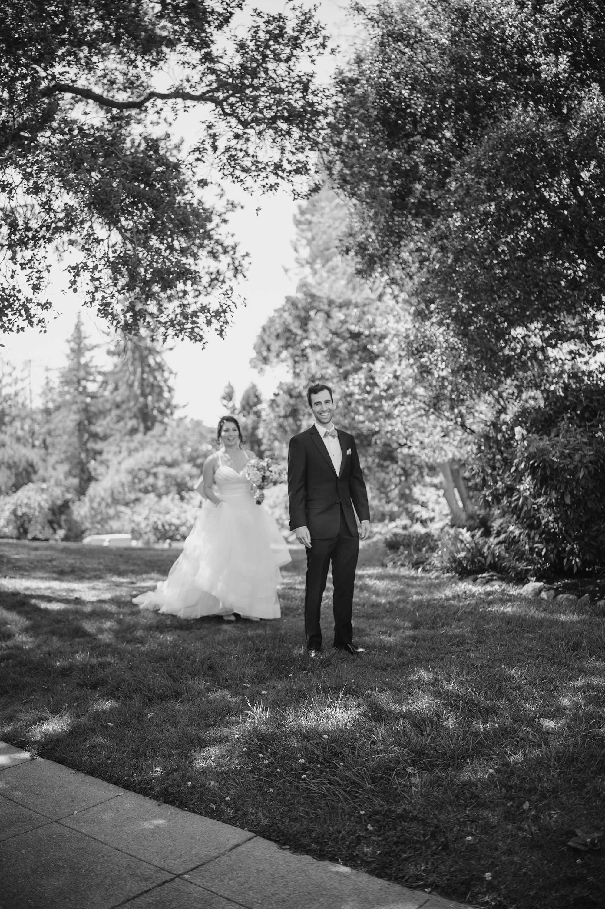 Love Knot Photography captures beautiful first look with bride and groom in black and white