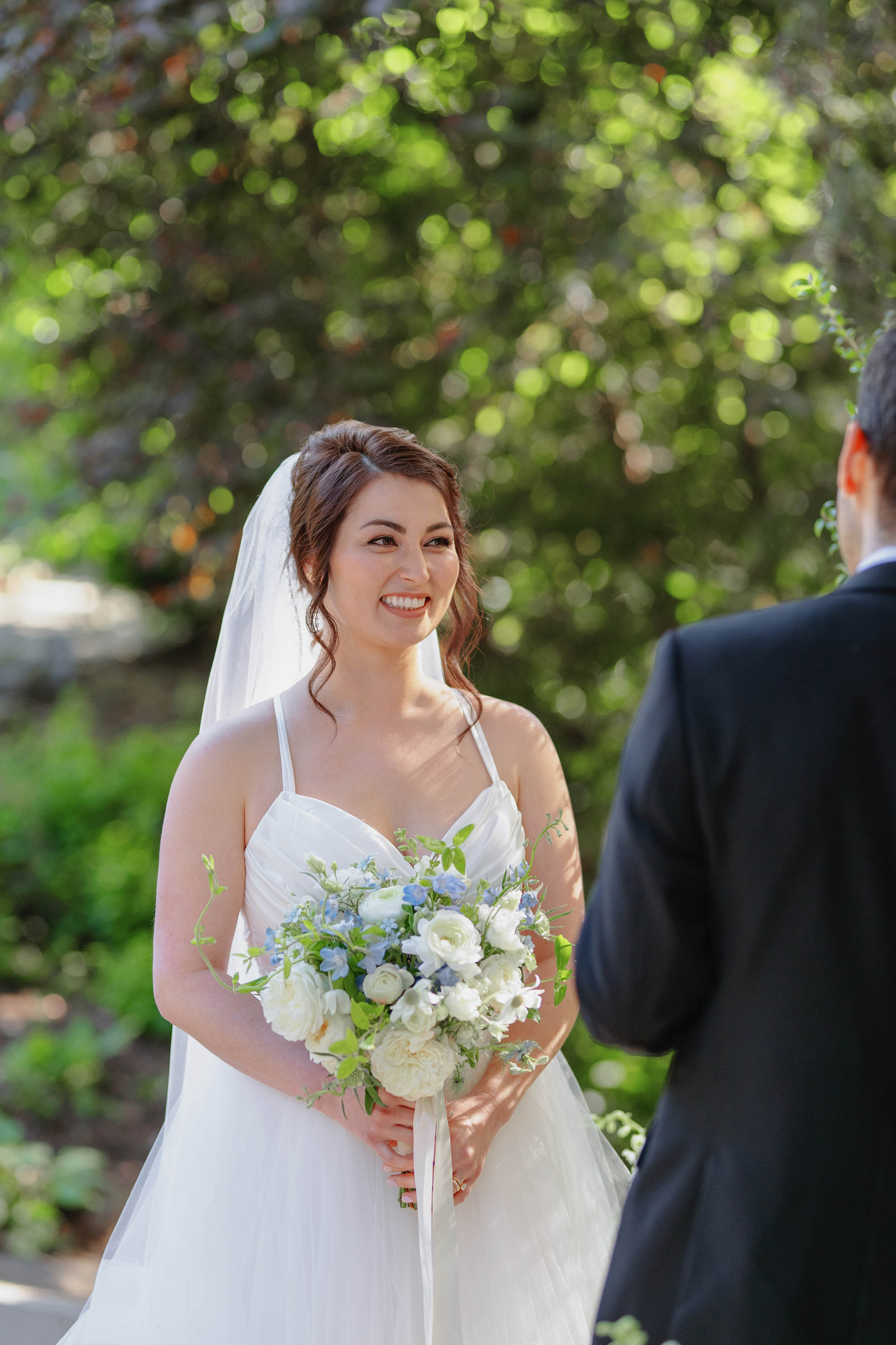 gorgeous bride captured in candid moment by true to color photographer Love Knot Photography