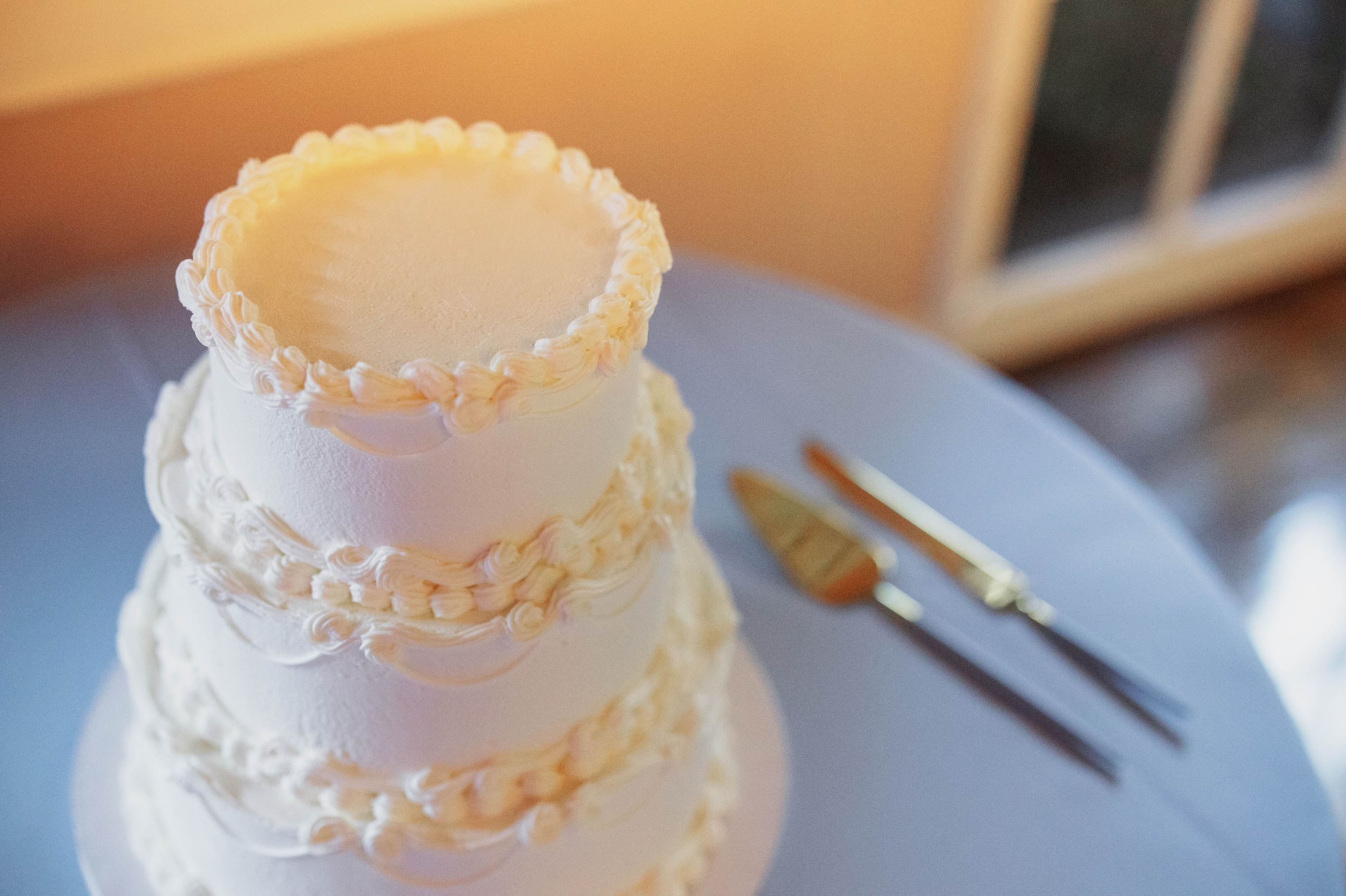 beautiful white wedding cake at wedding reception in Oakland, California
