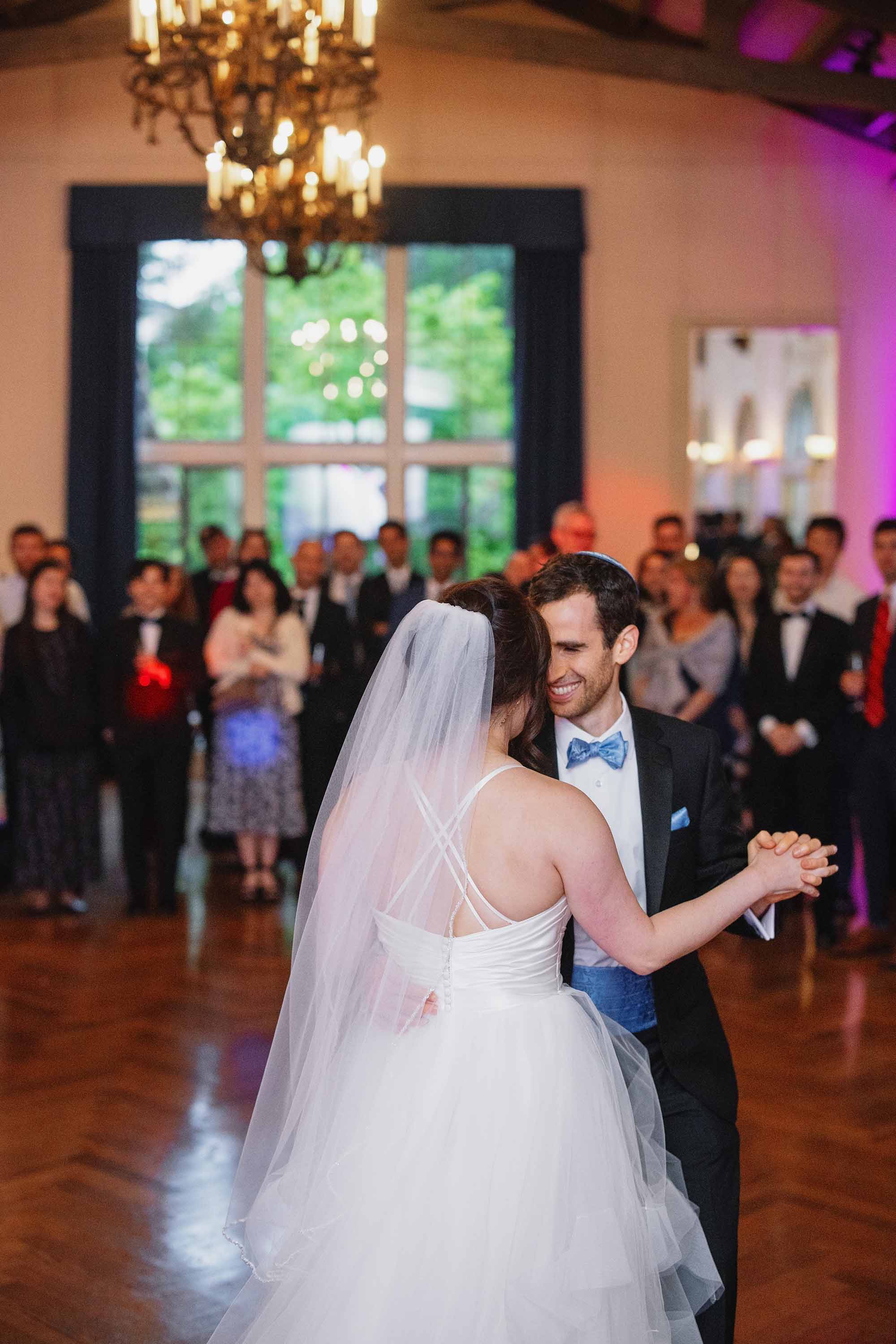 Love Knot Photography captures bride and groom in this gorgeous candid moment