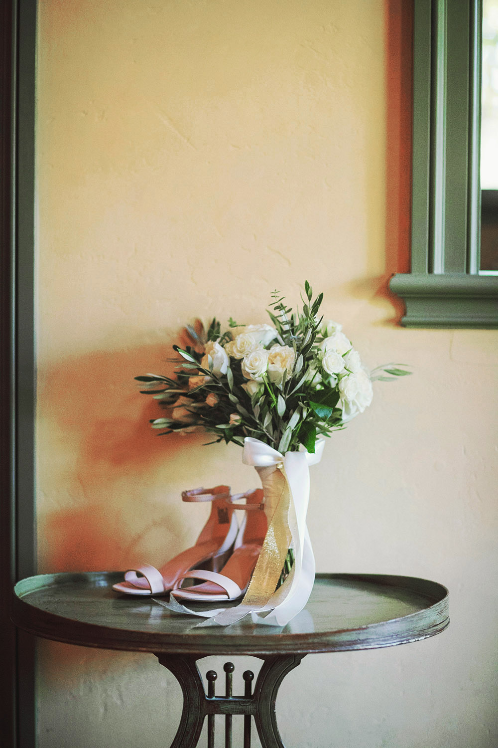 bride's bouquet and her shoes